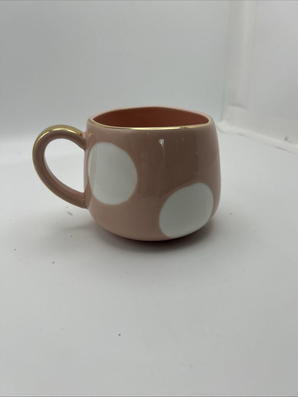 Polka Dot Pink Snuggle Mug With Gold Edging.